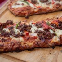 Double Down Flat Bread · Sausage, Bacon, Pepperoni, Onions, Peppers, Basil, Garlic, and Mozzarella Blend