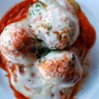 Sicilian Meatball · 3 pieces. Homemade meatballs in a spicy marinara sauce. Topped with smoked mozzarella cheese.