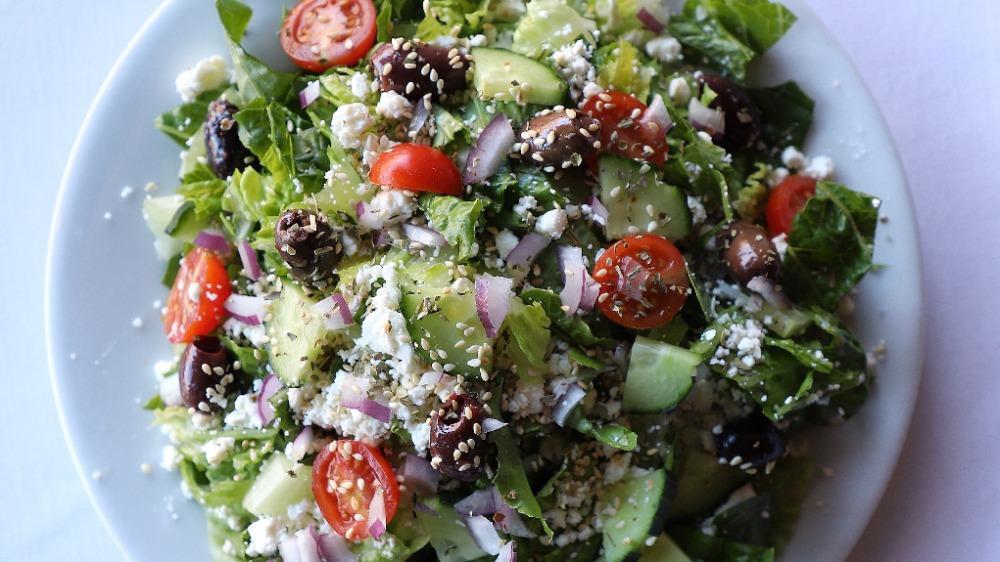 Greek Salad (Party (Serves 6-12)) · Cucumber, Kalamata olives, tomato, red onion, oregano, sesame seed and feta cheese. Served with vinaigrette.