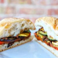 Grilled Veggie Sandwich · Grilled marinated eggplant, zucchini, red peppers, caramelized onions and smoked mozzarella ...