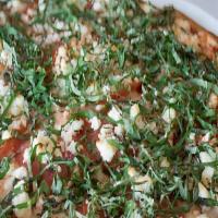 Margherita Pizza · Fresh tomatoes, goat cheese, fresh basil and roasted garlic.