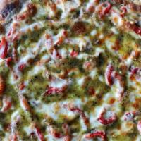 Chicken Pesto Pizza · Grilled, marinated chicken with pesto, roasted red peppers and toasted pine nuts. Topped wit...