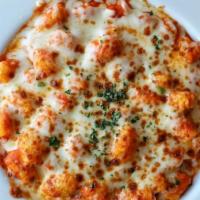 Baked Gnocchi · Tossed in marinara sauce and baked Roman style with mozzarella cheese.