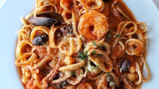Pasta Puttanesca · Linguine served with a tomato based sauce, tender calamari, jumbo shrimp, bay scallops, Italian Gaeta olives and capers.