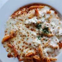 Baked Penne · Penne in our delicious marinara, topped with ricotta and mozzarella cheese then baked to per...