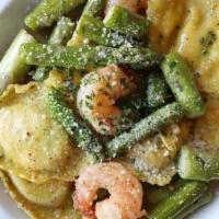Lobster Ravioli · Ravioli filled with chunky Maine lobster, rock shrimp and cheeses with fresh asparagus and g...