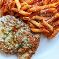Chicken Parmesan · Chicken breast covered in marinara sauce atop a bed of penne pasta.