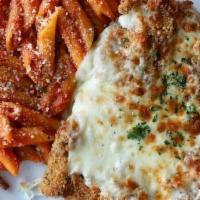 Veal Parmesan · Veal covered in marinara sauce. Served on top of a bed of penne pasta.