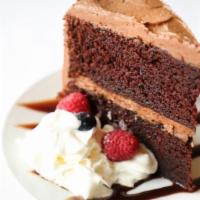 Lucca'S Chocolate Cake · Chocolate layer cake with chocolate Swiss meringue buttercream.