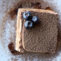 Tiramisu · Espresso and zabaglione liqueur smoked the sponge cake layer with mascarpone cheese and cocoa.