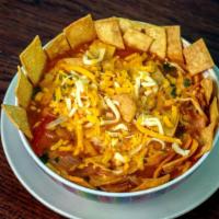 Chicken Tortilla Soup · A delicious soup made to order, consisting of onions, tomatoes, and chunks of shredded chick...