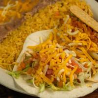Taco Dinner · Two chicken or beef ground or shredded tacos made in crispy corn shells or soft flour tortil...