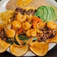 Ranchero Steak & Shrimp · 5 Oz. steak or chicken and six shrimp cooked with onions, tomatoes, jalapenos served with ri...