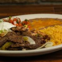 Fajita · Your choice of chicken, beef, sausage or mixed fajitas heaped with grilled bell peppers and ...
