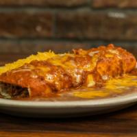 Burrito · Flour tortilla filled with beans and shredded beef then topped with chili. Served with rice,...