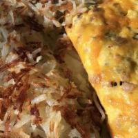 Meat Lovers Omelette · All natural ham, sausage, bacon and cheddar cheese.