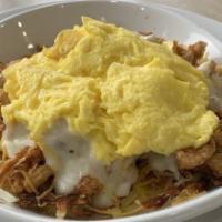Chicken Tender Skillet · All-natural chicken strips, two cage-free eggs any style with homemade sausage gravy and che...