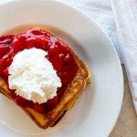 Stuffed French Toast · French toast stuffed with sweet cream cheese filling, with cool strawberries and whipped cre...