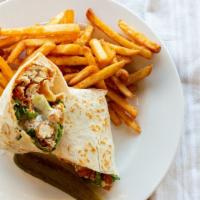 Crispy Chicken Ranch Wrap · All natural crispy chicken strips, shredded lettuce, tomatoes, cheddar cheese and ranch dres...