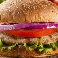 Turkey Burger · A juicy, seasoned turkey burger topped with lettuce, tomato, and onion. A delicious alternat...