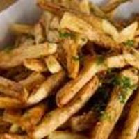 Garlic Fries · French fries topped with garlic and parsley.