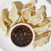 Steamed Dumplings · Steamed dumplings with your choice of filling (6 pieces).