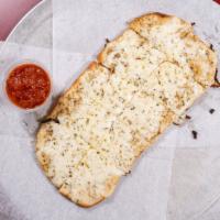 Garlic Cheese Bread · Crispy, cheesy, garlic bread. Served with a 4 oz. large side of our marinara sauce.