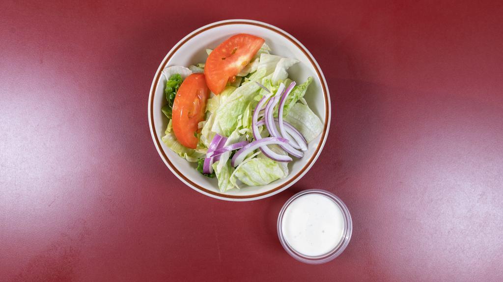 Side Salad · A side-serving of Frank's lettuce mix with red onion and tomato. Includes a 2 oz. small side of dressing.
