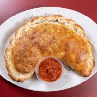 Calzone Large (Feeds 2-3) · Build your Calzone just the way you like it! Served with a side of Marinara (4 oz).
