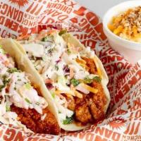Hot! Chicken Tacos · Hot! chicken with house-made slaw, cheddar, and lemon mayo.