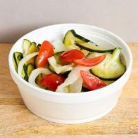 Cucumber & Onion Salad · Cucumber, onion, cherry tomato, vinegar and oil.