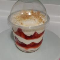 Strawberry · Our rich and creamy cheesecake cups layered with strawberry filling and has a graham cracker...