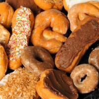Random Variety Dozen  · A dozen of our donuts randomly selected from the variety we have for the day. The only optio...