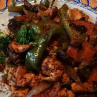 Chicken Ghallaba · Pan sauteed chicken with carrot, mushrooms, green peppers, onions, and tomatoes. Add hommous...