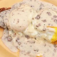 The Morning Mullet · Two eggs, hash browns served on top of our half order of biscuits and gravy.