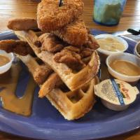 New Chicken & Waffles · Born in the south but perfected at mullet's. A giant waffle served with flaky fried chicken ...