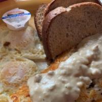 Meatloaf Hash Browns · Hash browns with our homemade breakfast meatloaf mixed with red pepper, onions and smothered...