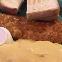 Cordon Bleu (Chef'S Choice) · Three egg omelet with chicken, ham and swiss cheese, smothered with hollandaise sauce.
