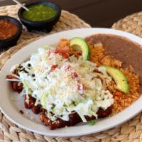 Enchiladas · 3 rolled tortilla dipped in RED MOLLE sauce, with your choice of meat, and served with lettu...