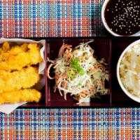 Shrimp Tempura · Six pieces of jumbo shrimp tempura served with steamed rice, wasabi slaw, and sweet chili di...