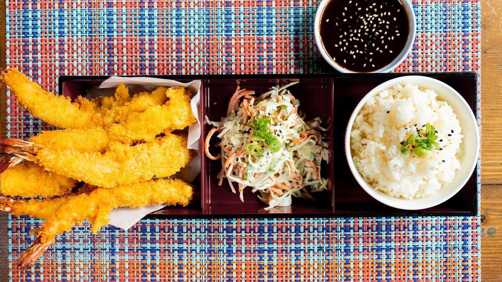 Shrimp Tempura · Six pieces of jumbo shrimp tempura served with steamed rice, wasabi slaw, and sweet chili dipping sauce.