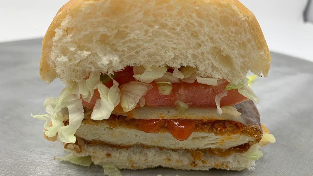 Buffalo Chicken Sub · Breaded chicken patty soaked in buffalo sauce, lettuce, tomato and cheese.