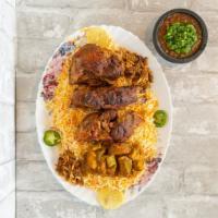 Lamb Haneeth · House favorite. Slow roasted lamb seasoned and cooked to perfection served with a bed of ric...
