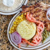 Chicken Breast Dinner · Grilled chicken breast with tomatoes, onions, gyro sauce and pita bread.