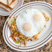 Roman Special · Two eggs with ham, bacon or sausage, onions, green peppers and Cheddar cheese over hash brow...
