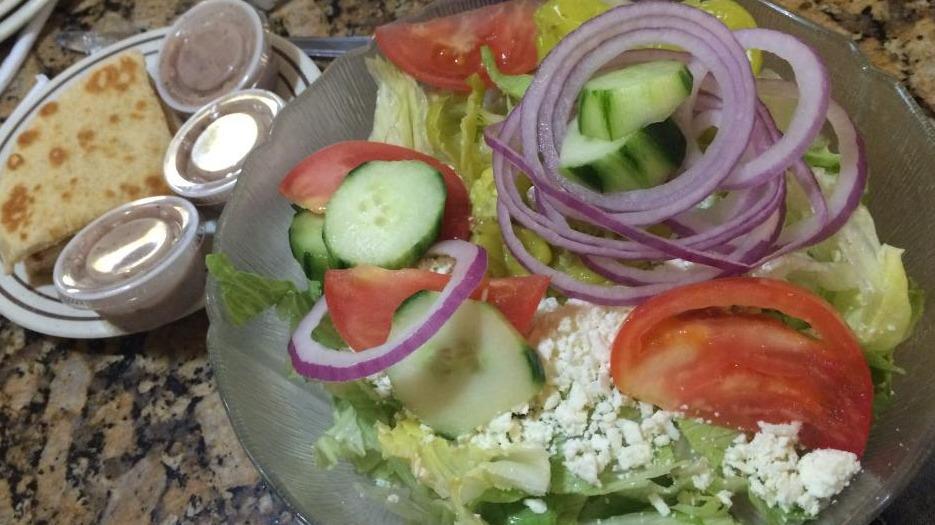 Chef'S Salad · Sliced turkey, ham, Swiss and American cheeses, lettuce, tomatoes,
onions, hard-boiled eggs and pita bread.