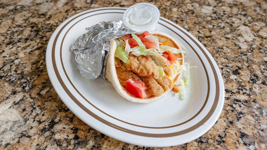Chicken Tender Melt · Sliced chicken tenders, melted American and Swiss cheeses, lettuce and tomatoes on pita.