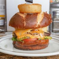 Onion Ring Burger · With lettuce, tomato, pickles, Swiss cheese and onion rings.
Topped with Thousand Island dre...