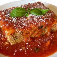Eggplant Parmesan · À la carte.
Our homemade Eggplant Parmesan is lightly breaded and layered with marinara sauc...