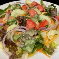 Side Salad · Our side salad includes freshly chopped iceberg lettuce, mixed greens, tomato, red onion and...